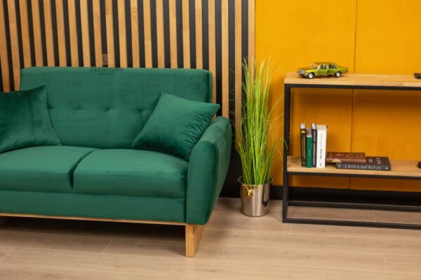 sofa zielona z poduszkami