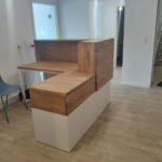 Biała lada recepcyjna dla niemieckiej firmy Gesundheit Wurmtal Praxis fur Ergotherapie